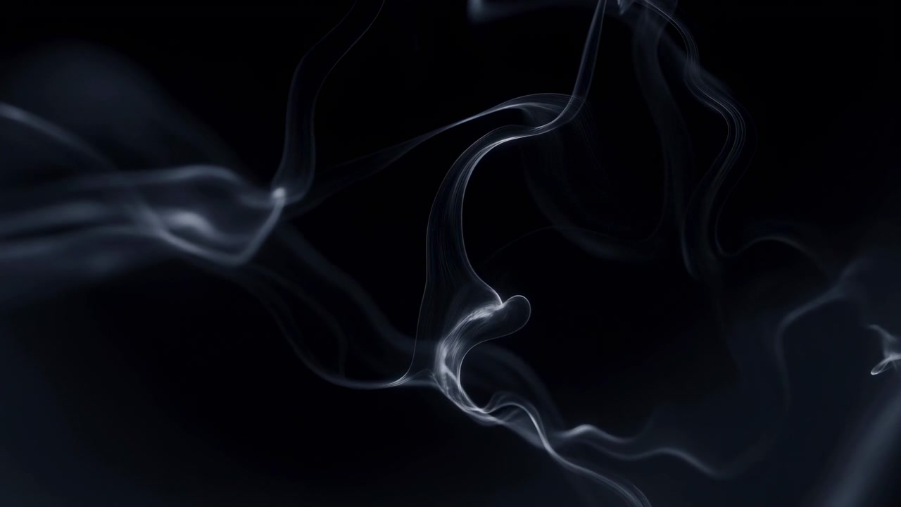 Delicate translucent smoke ribbons curl and drift across deep black studio background, forming soft loops, layered wisps, and slender trails with pearlescent highlights, subtle sheen, and