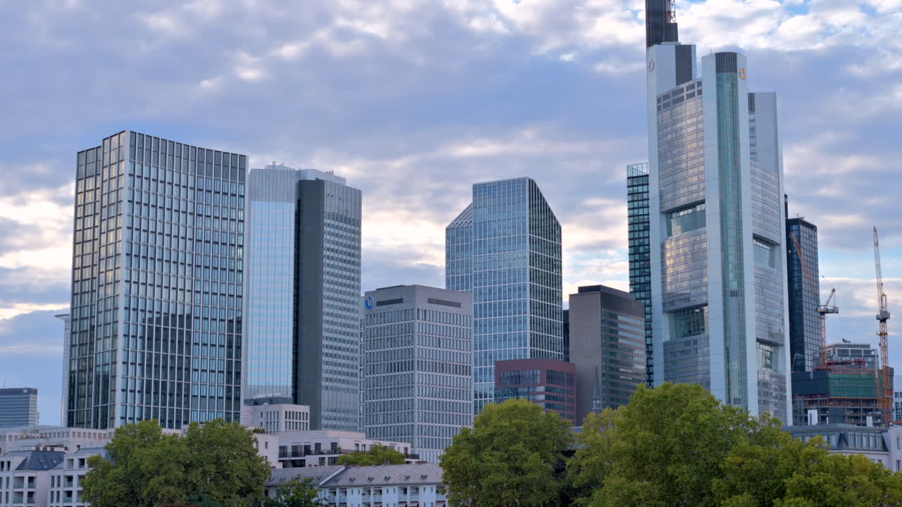 View of the skyline of Frankfurt from across river Main in the evening