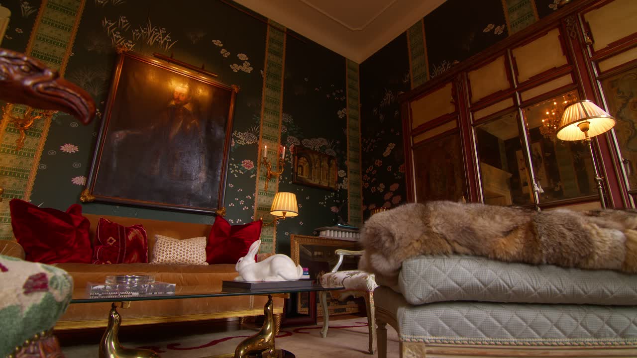 Static zoom-in shot revealing classical living room with elegant interior design in a Milan apartment, Italy, highlighting refined decor and style