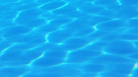 light shining onto blue swimming pool