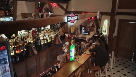 stylish wooden bar with customers