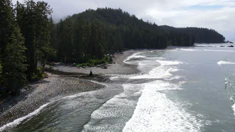 Aerial-footage-in-4k-of-Sombrio-beach-on-a-cloudy-day-during-spring-of-2021