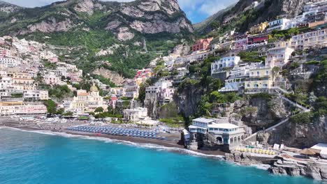 amalfi coast at positano in salerno italy. coastal city. waterfront landscape. amalfi coast at positano in salerno italy. beach scenery. medieval buildings. amalfi coast skyline