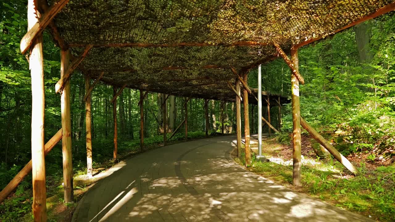 Wooden covered road inside wolf lair, Poland showing wartime infrastructure