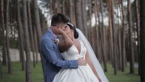 wedding couple making a kiss. lovely groom and bride. happy family