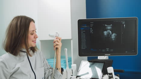 doctor performing ultrasound scan