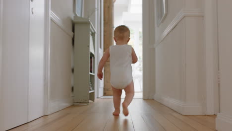 baby boy learning to walk toddler exploring home curious infant walking through house enjoying childhood