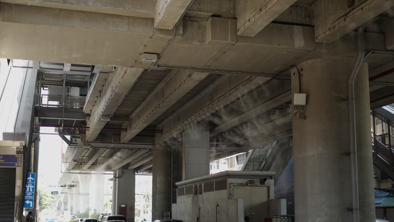 Misting System Under Elevated Concrete Skytrain Tracks in Bangkok