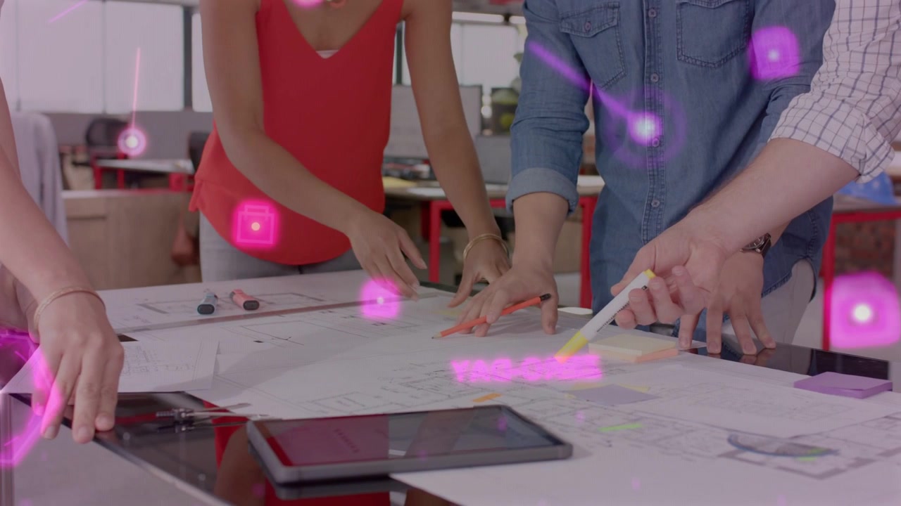 Designers leaning over plans hands reaching and placing notes pink overlay tracing hands for design