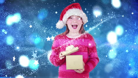 una niña festiva abriendo un regalo mágico de navidad