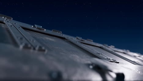 metallic structure under a starry night sky