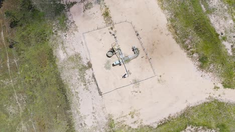 rotating aerial view of underground gas facility