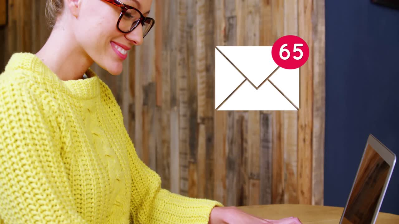 Woman typing messages on a laptop 4k