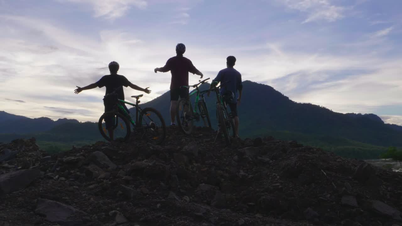 Friends Celebrating a Mountain Bike Trip