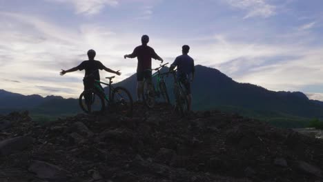 friends celebrating a mountain bike trip