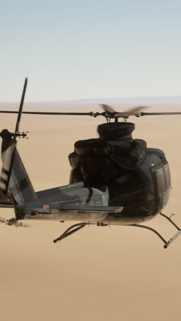 military helicopter in a desert landscape