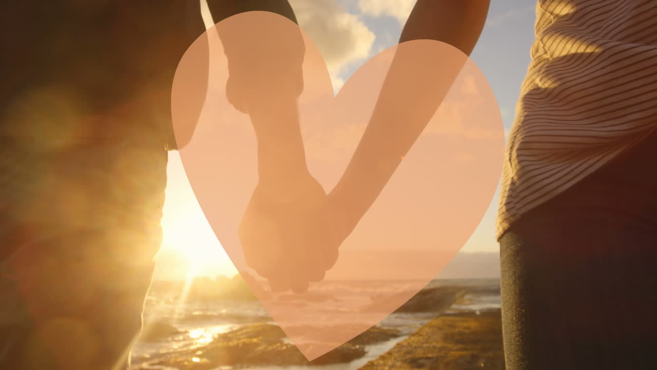 손을 잡고 있는 사람 들 위 에  ⁇ 은 심장 의 애니메이션