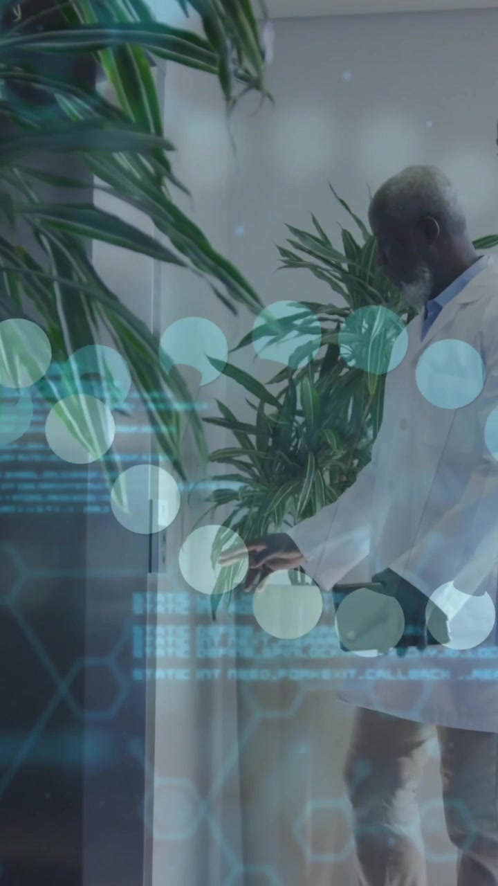Animation of data processing and dna strand over diverse doctors talking