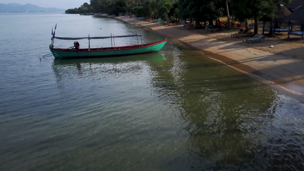 Beach scene with a boat