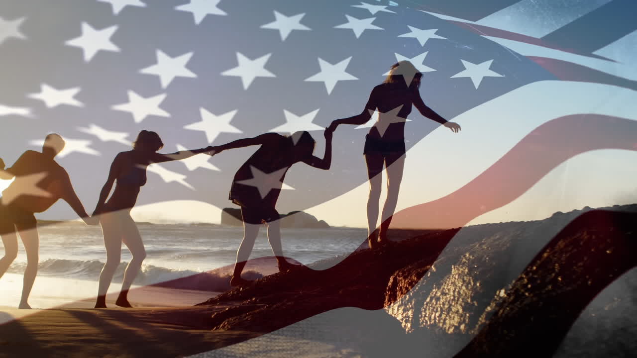 해변에서  ⁇ 는 동안 손을 잡고 있는 친구들