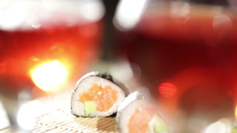 sushi rolls and plum wine beautiful shallow dof