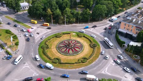 4k aerial view timelapse of roundabout road with circular cars in small european city