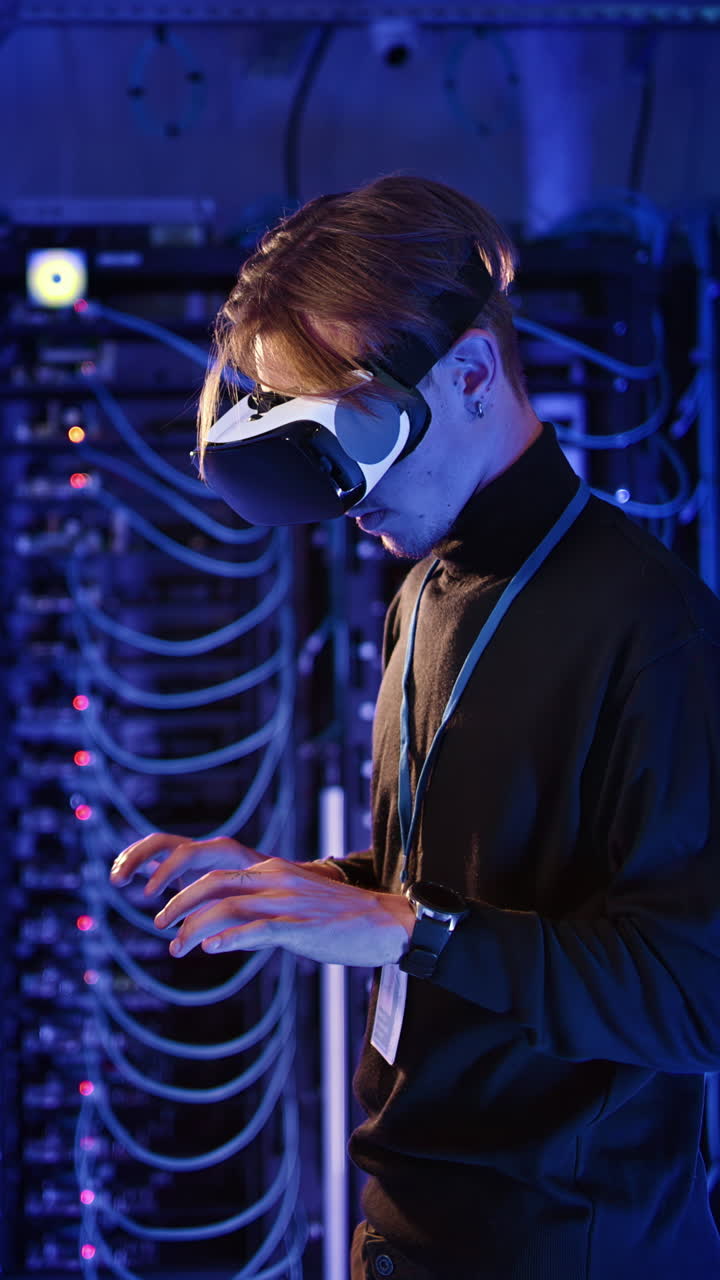 Man using Virtual Reality headset in a server room. Vertical