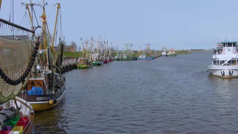 Drone-flight-over-a-cozy-little-fishing-village-in-germany