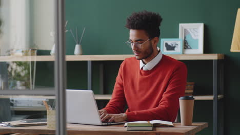 young man working at a modern office