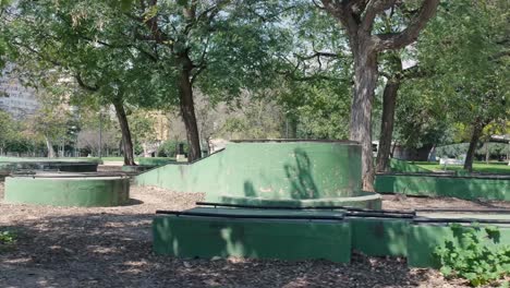 urban park with graffiti and playground equipment