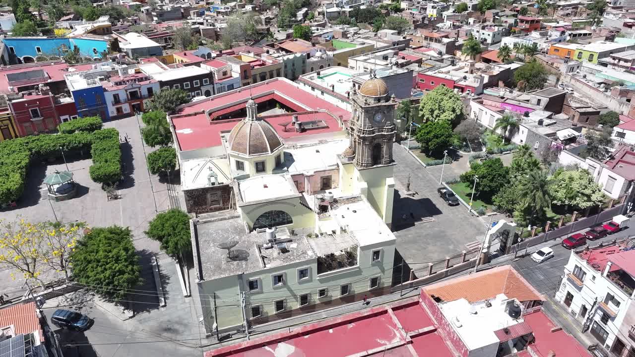 The Inmaculada Concepcion Parish catholic church of Immaculate Conception in Amatitan in hot sunny daylight, Jalisco, Drone shot