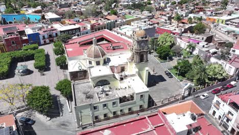 The Inmaculada Concepcion Parish catholic church of Immaculate Conception in Amatitan in hot sunny daylight, Jalisco, Drone shot