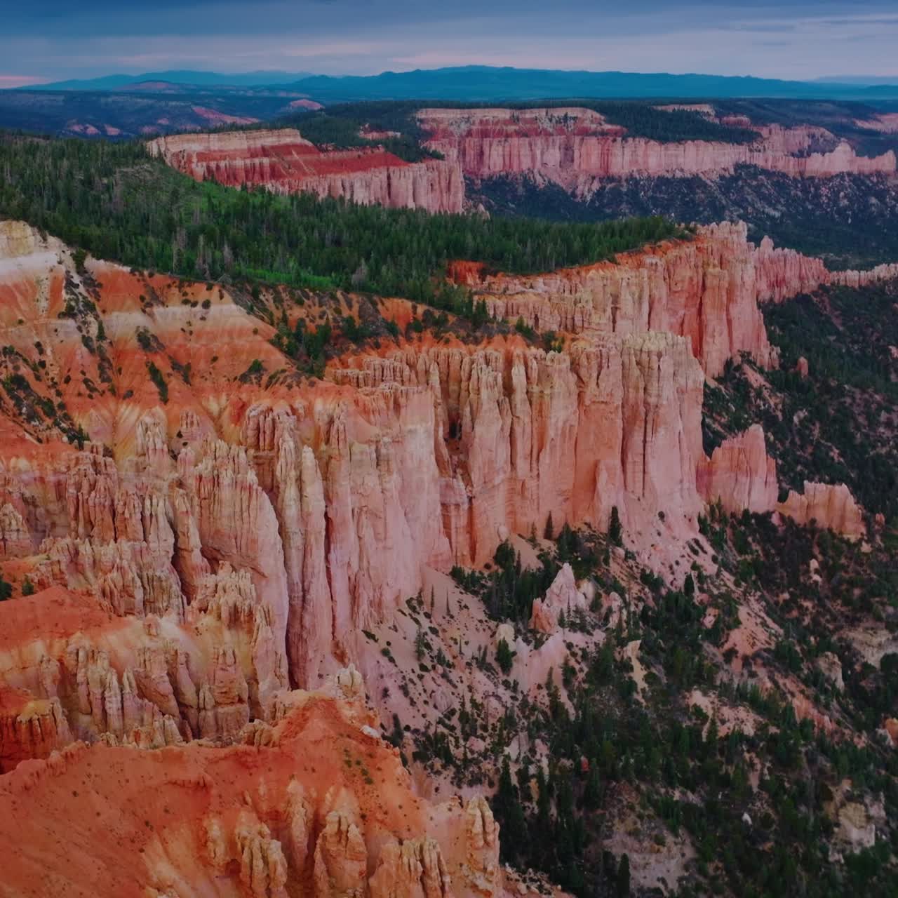 Splendid scenic view of Bryce Canyon. Endless mountainous territory overgrown with pine trees. Aerial perspective