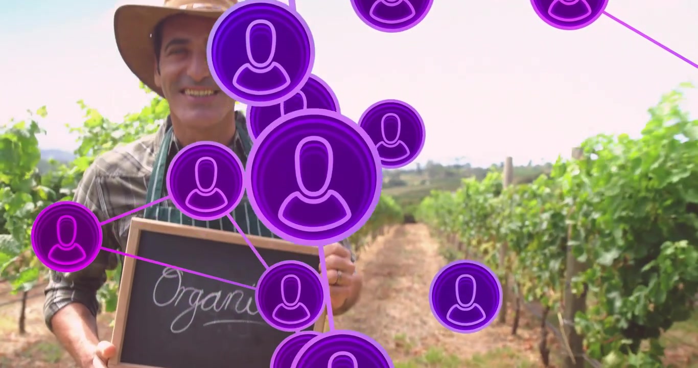 Animazione che inizia con nodi viola che collegano un agricoltore che regge un cartello e indica, mostrando viti biologiche.