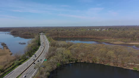 an aerial view of reflective lakes during a clear day