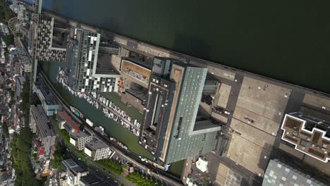 vertical aerial footage of kranhäuser im rheinauhafen buildings, cologne