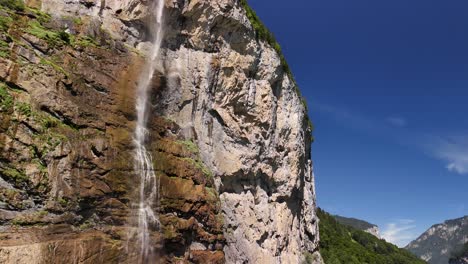 staubbach waterfall falls, swiss alps mountain rocky cliff, switzerland nature