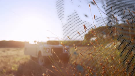 driving off-road vehicle through field with digital animation overlay pattern