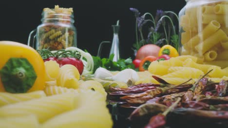 uncooked dried pasta and fresh vegetables