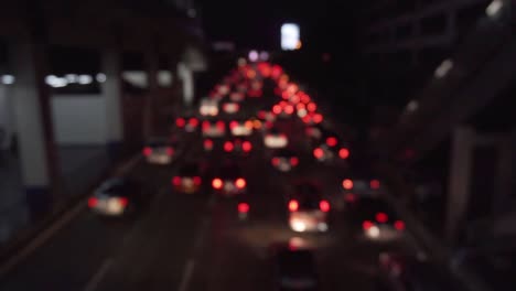 Rote-Bokeh-Autolichter-Im-Verkehr