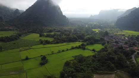 panoramic aerial view of the village of naka, laos, on a cloudy day