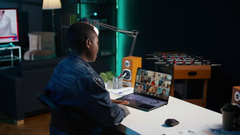 woman in a video conference call from her home office.