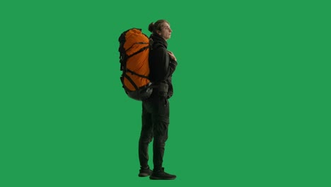 man with backpack on green screen