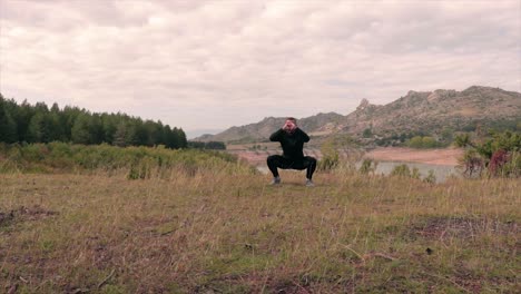 man making exercises in nature