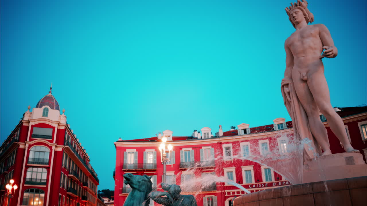 Nice, France - October 8, 2024: Close up of the Fontaine du Soleil at Place Massena in the evening