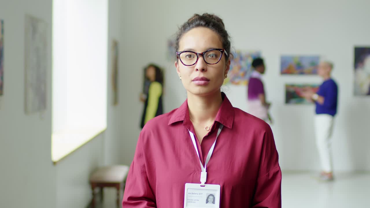 Portrait of Female Exhibition Guide in Art Gallery