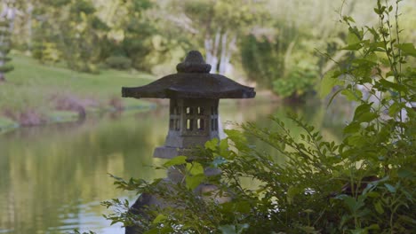 Stone-lantern-at-Santo-Domingo-Japanese-Garden,-Dominican-Republic