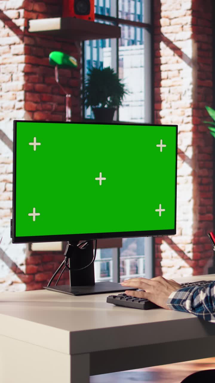 Vertical video Teleworker in living room home office using chroma key PC to answer emails