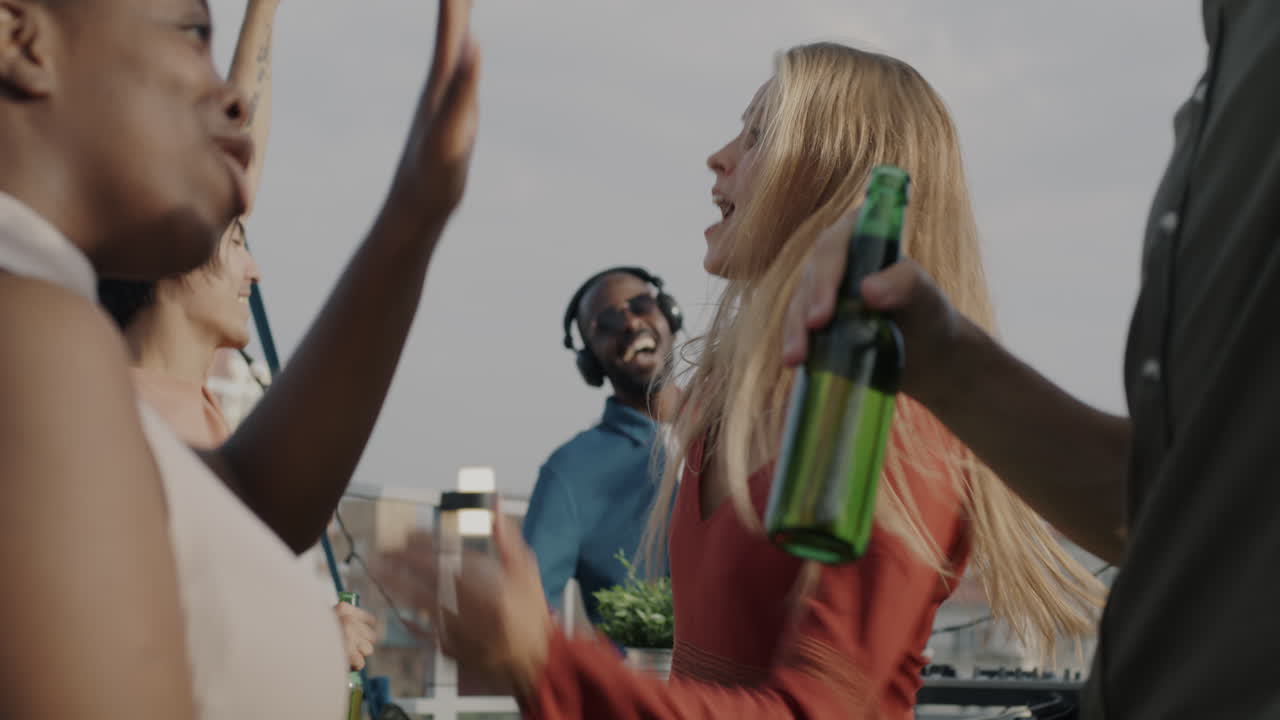 Friends Dancing on a Rooftop