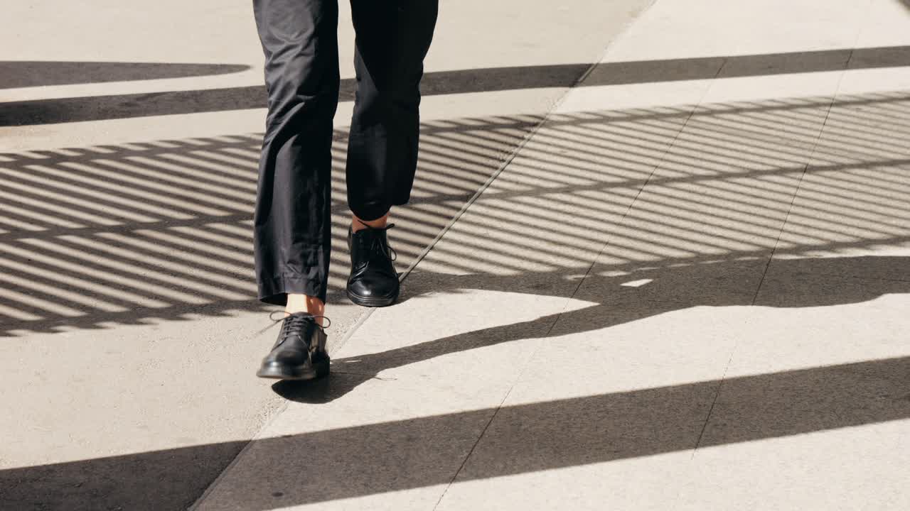 Person walking on patterned surface